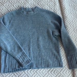 Gently used baby blue sweater. From pet free and non smoking home. Size xs